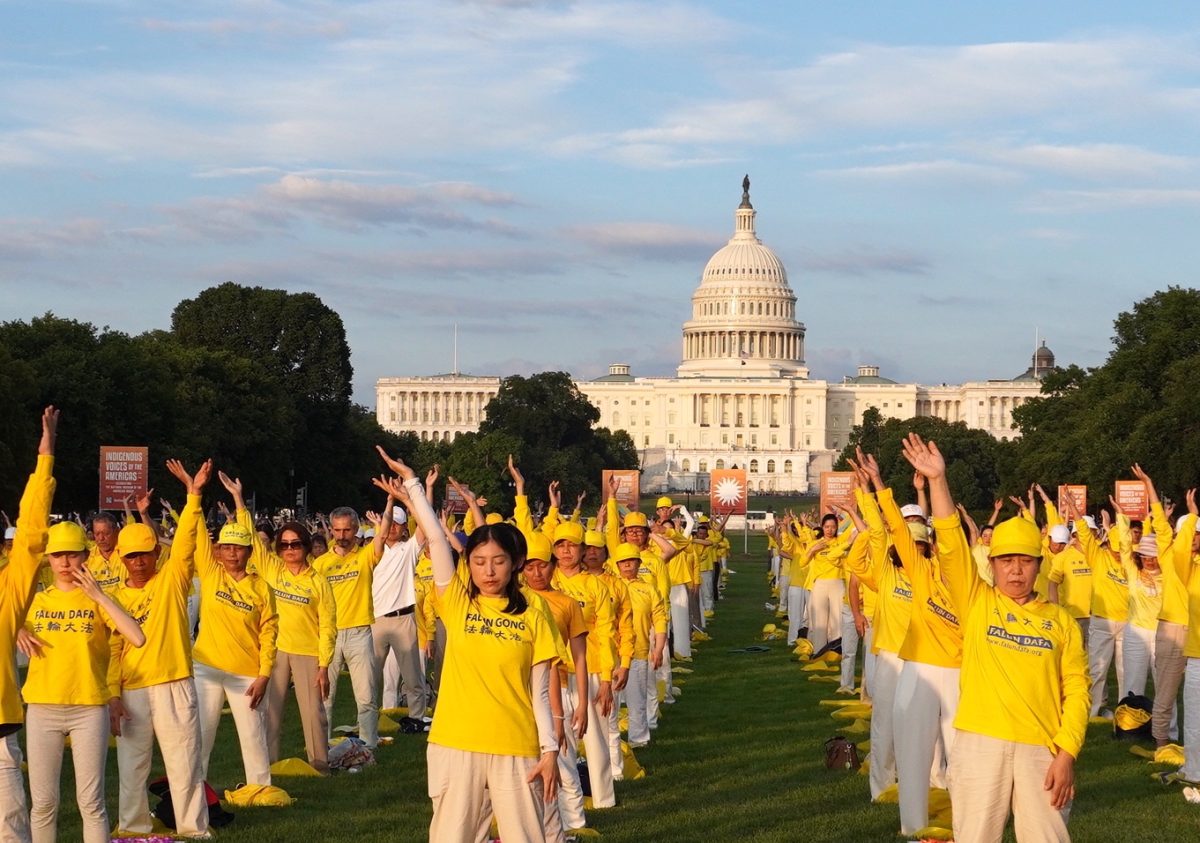 Falun Gong practitioners take part in a rally on July 11, 2024 at Capitol Hill to demonstrate their meditation practice and protest the Chinese communist regime’s 25 years of persecution against their faith in its native China. (Image: Yu Lili/The Epoch Times)