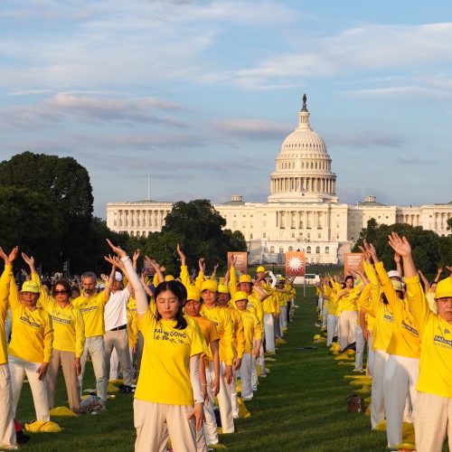 Falun Gong practitioners take part in a rally on July 11, 2024 at Capitol Hill to demonstrate their meditation practice and protest the Chinese communist regime’s 25 years of persecution against their faith in its native China. (Image: Yu Lili/The Epoch Times)